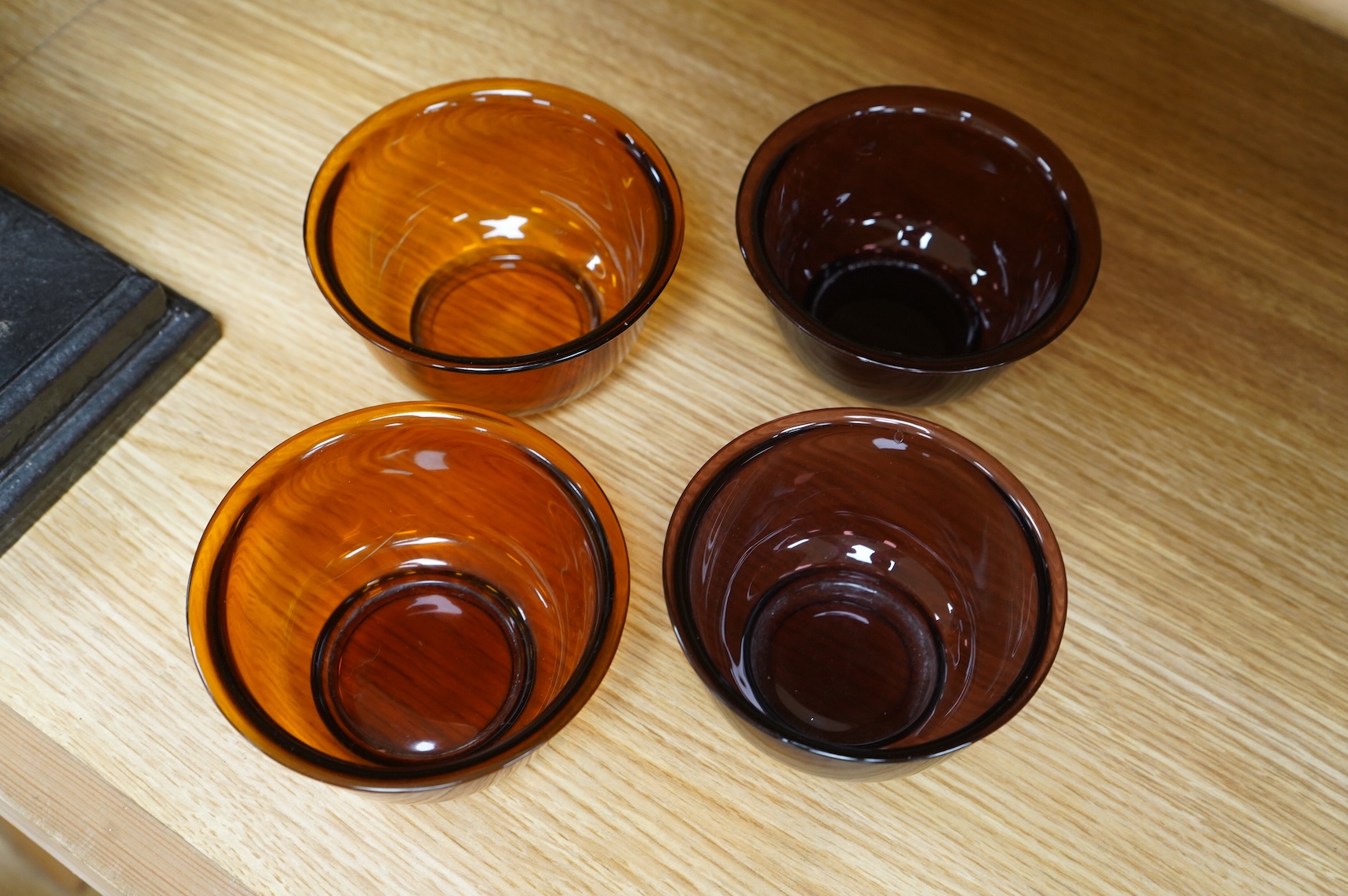 Two pairs of Chinese 'Peking' glass bowls, largest 11cm diameter